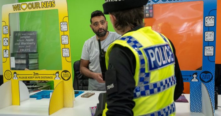 Devon & Cornwall Police Officers speaking with a trader in Torquay