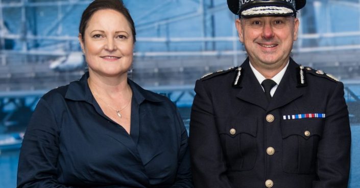 Police and Crime Commissioner Alison Hernandez standing next to Chief Constable James Vaughan in front of an image of the Tamar Bridge