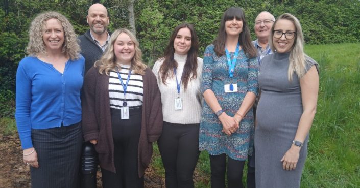 Members of staff from the Victim Care Unit stood outside its Exeter office