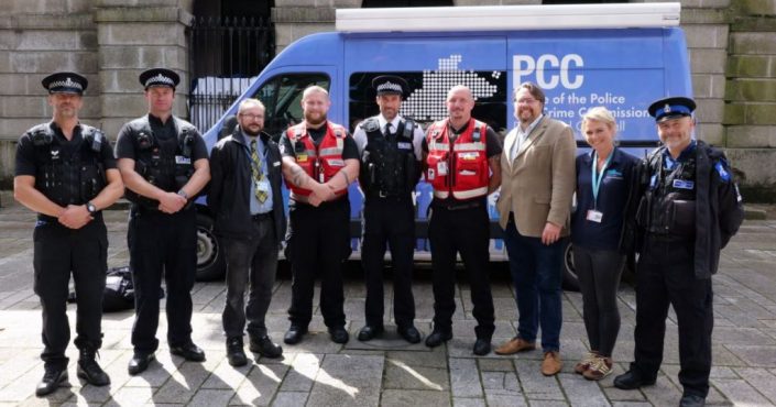 Officers and other representatives stood in front of the OPCC van at the launch of Hotspot Policing in Bodmin