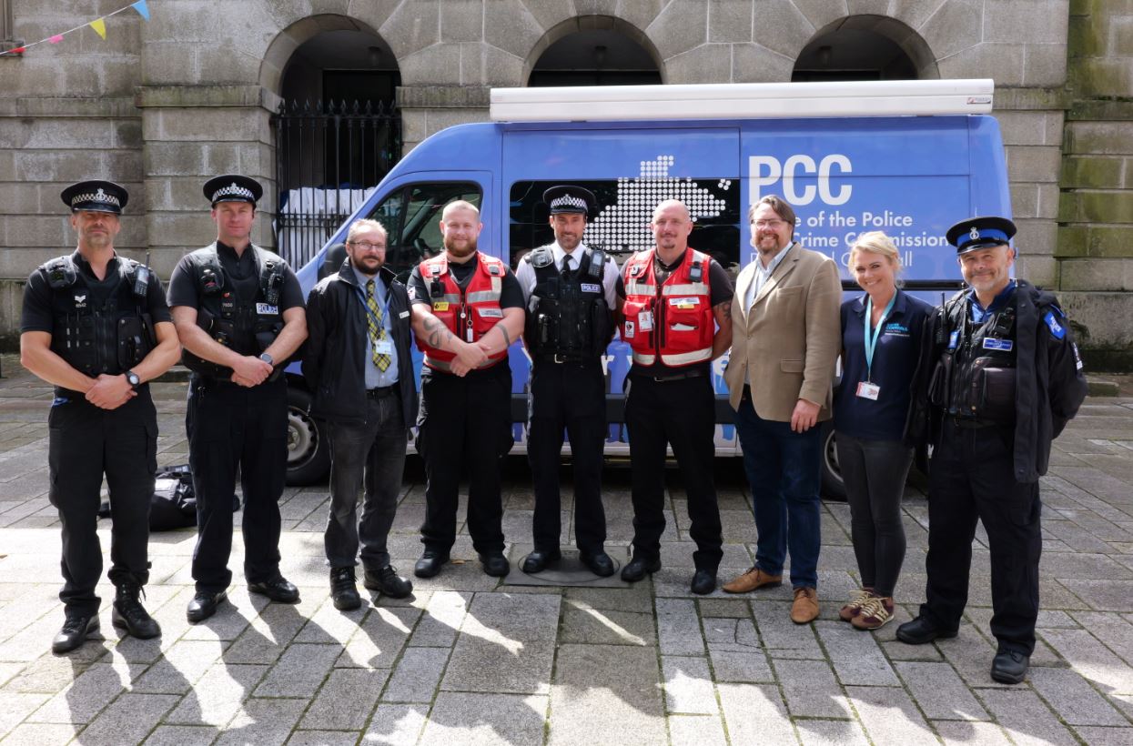 Officers and other representatives stood in front of the OPCC van at the launch of Hotspot Policing in Bodmin
