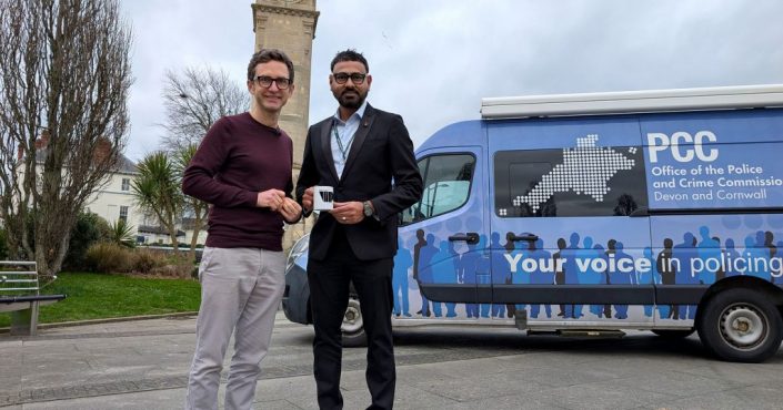 Your VIP host Ben Woolvin with hate crime advisor Councillor Syed Jusef standing outside the mobile studio in the town square at Barnstaple