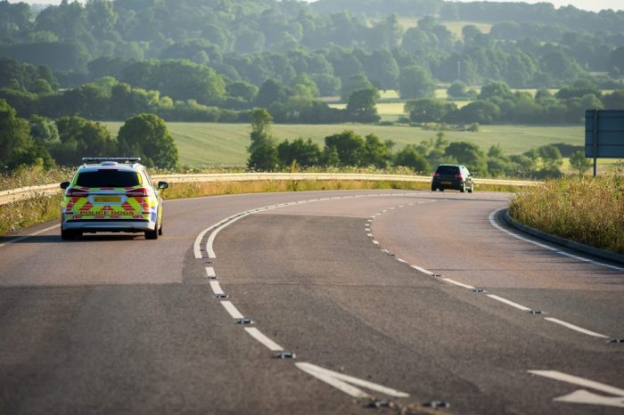 Police,Car,Moving,At,Speed,On,Uk,Motorway,In,England