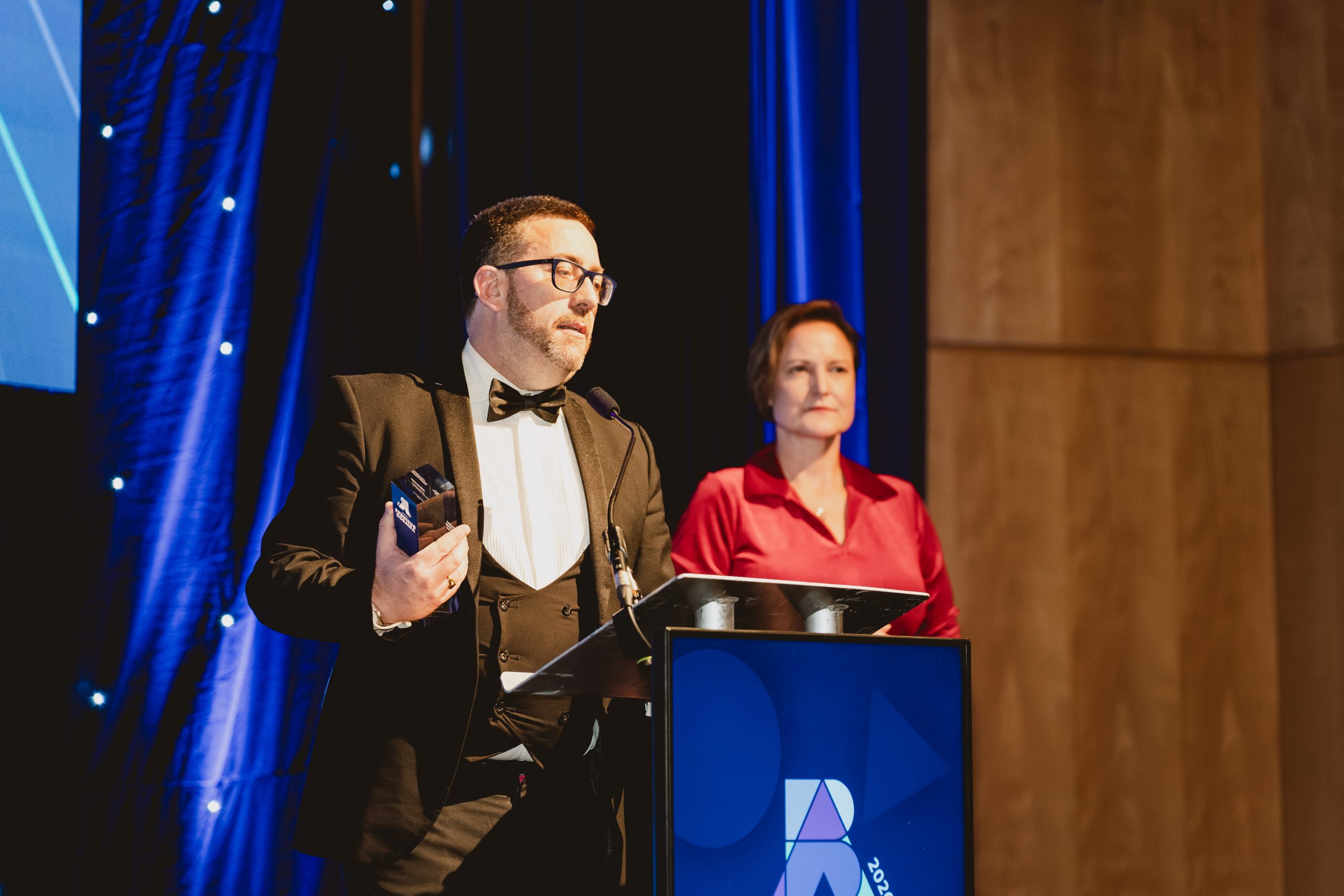 Andrew Bond receiving his award from Police and Crime Commissioner Alison Hernandez