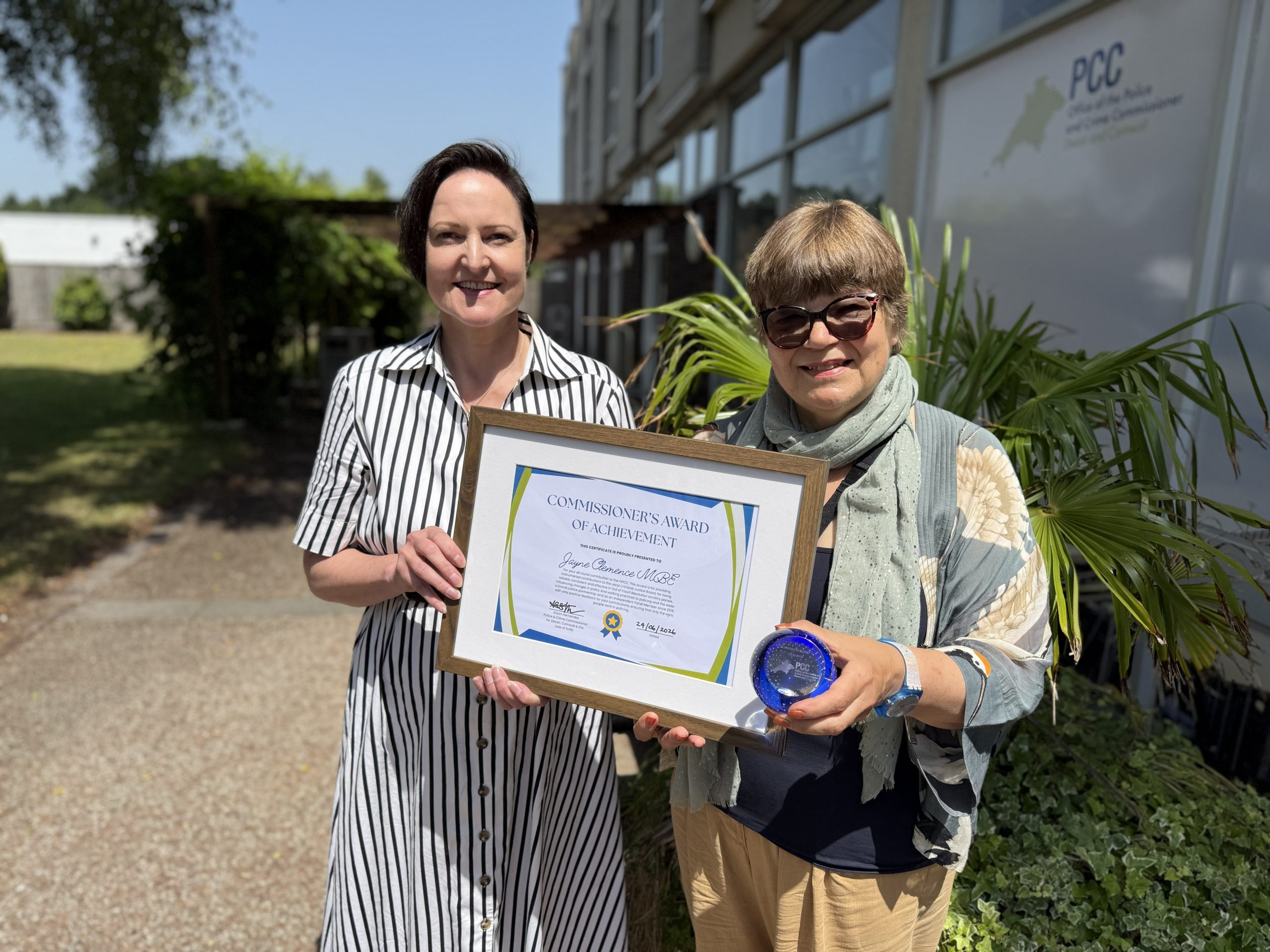 Jayne Clemence receiving her award from Police and Crime Commissioner Alison Hernandez