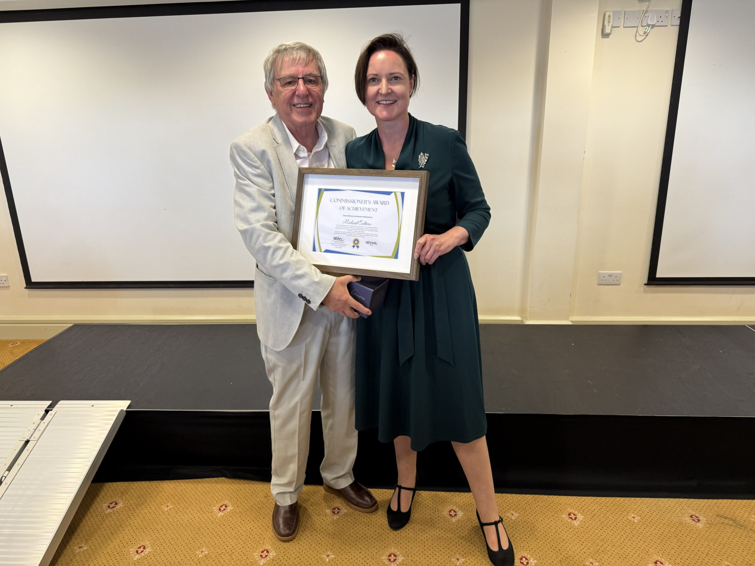 Mike Saltern receiving his award from Police and Crime Commissioner Alison Hernandez